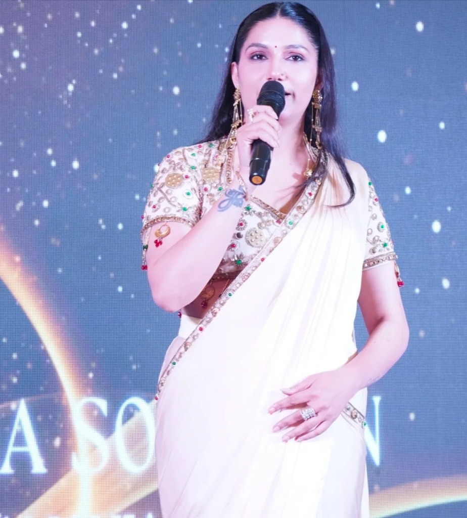 Sapna Choudhary speaking at Luxora stage